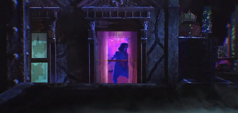 Joker the Harlequin (Vera Drew) dances in a parody of Selina Kyle's apartment from Batman Returns.